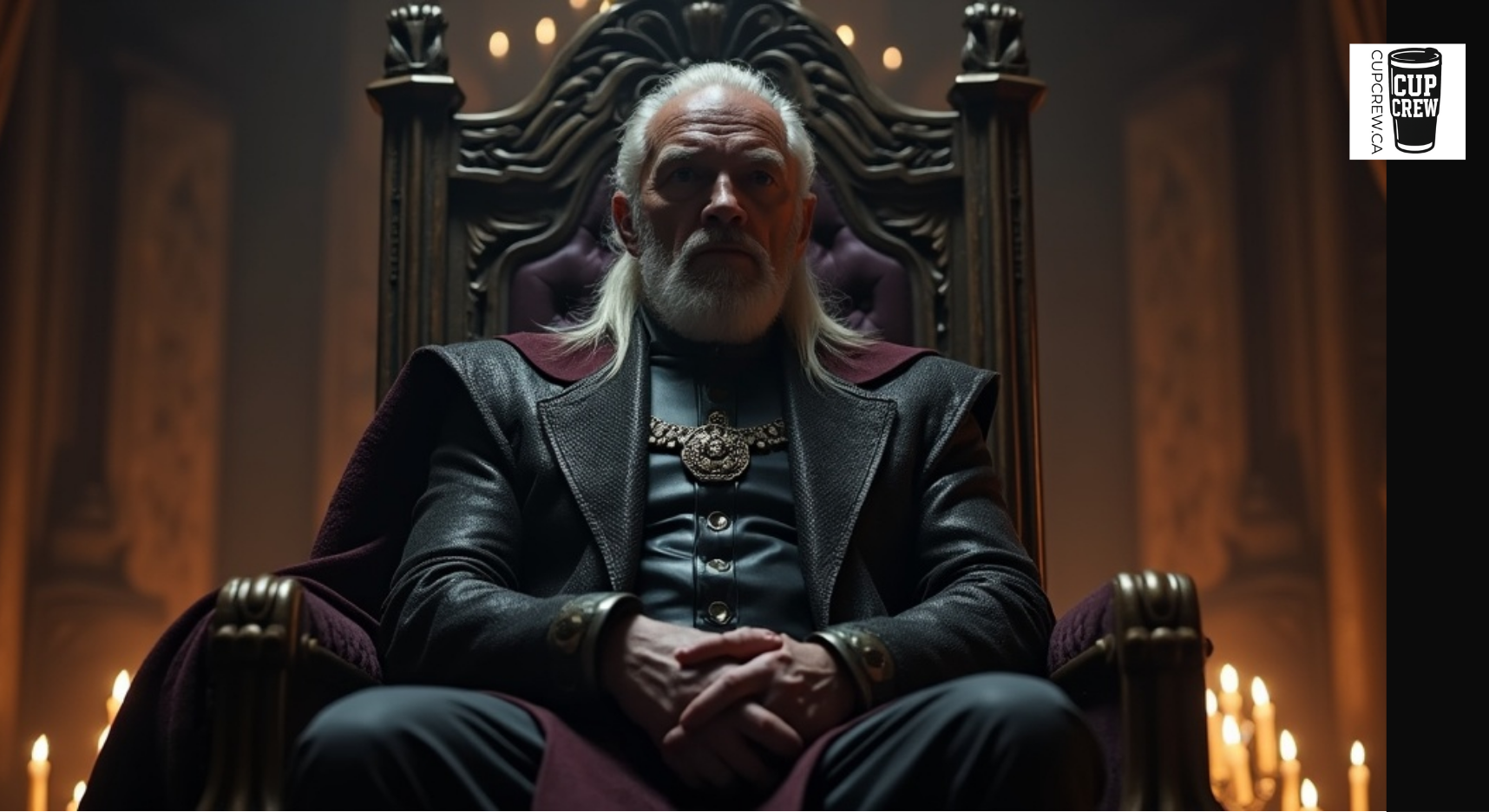 An older man with a long white beard and mustache, wearing a black leather jacket and sitting on a throne-like chair, with a serious expression on his face.
