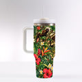 A tall insulated tumbler with a handle and a lid, featuring a vibrant tropical print design depicting various flora and fauna.